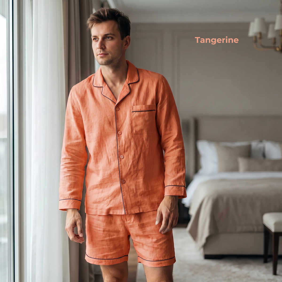 Man wearing orange pajamas standing in a bedroom with 'Tangerine' text.